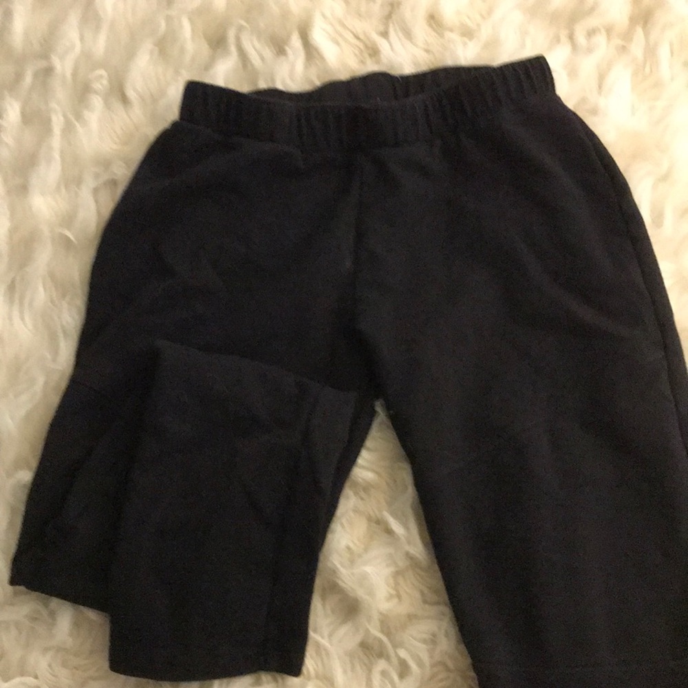 Black leggings with detailed knees
